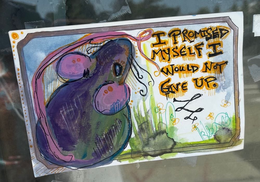 A large watercolor painting of a mouse. There is text that reads: I promised myself I would not give up.